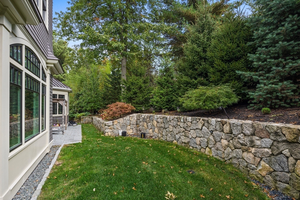 23 Crafts Road Brookline, MA 02467 - Photo 17 of 42 a view of an house with backyard space and garden