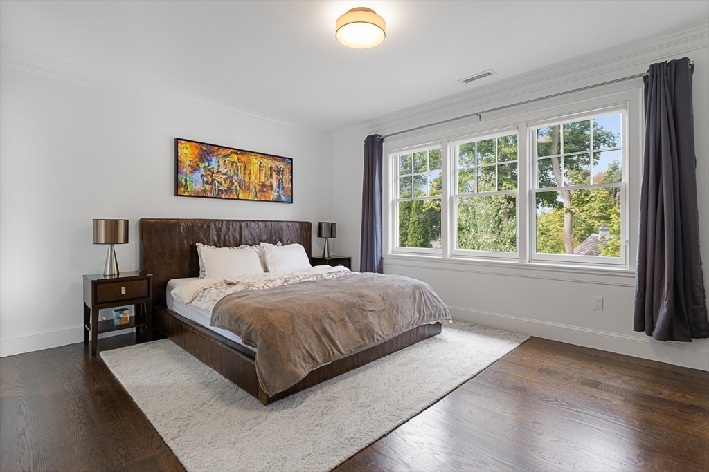 23 Crafts Road Brookline, MA 02467 - Photo 35 of 42 a bedroom with a bed and a window