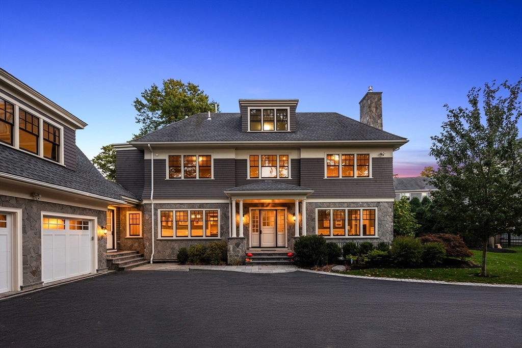 23 Crafts Road Brookline, MA 02467 - Photo 4 of 42 a front view of a residential apartment building with a yard