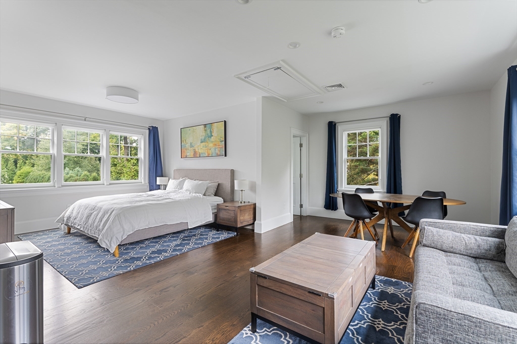 23 Crafts Road Brookline, MA 02467 - Photo 42 of 42 a living room with furniture and a large window