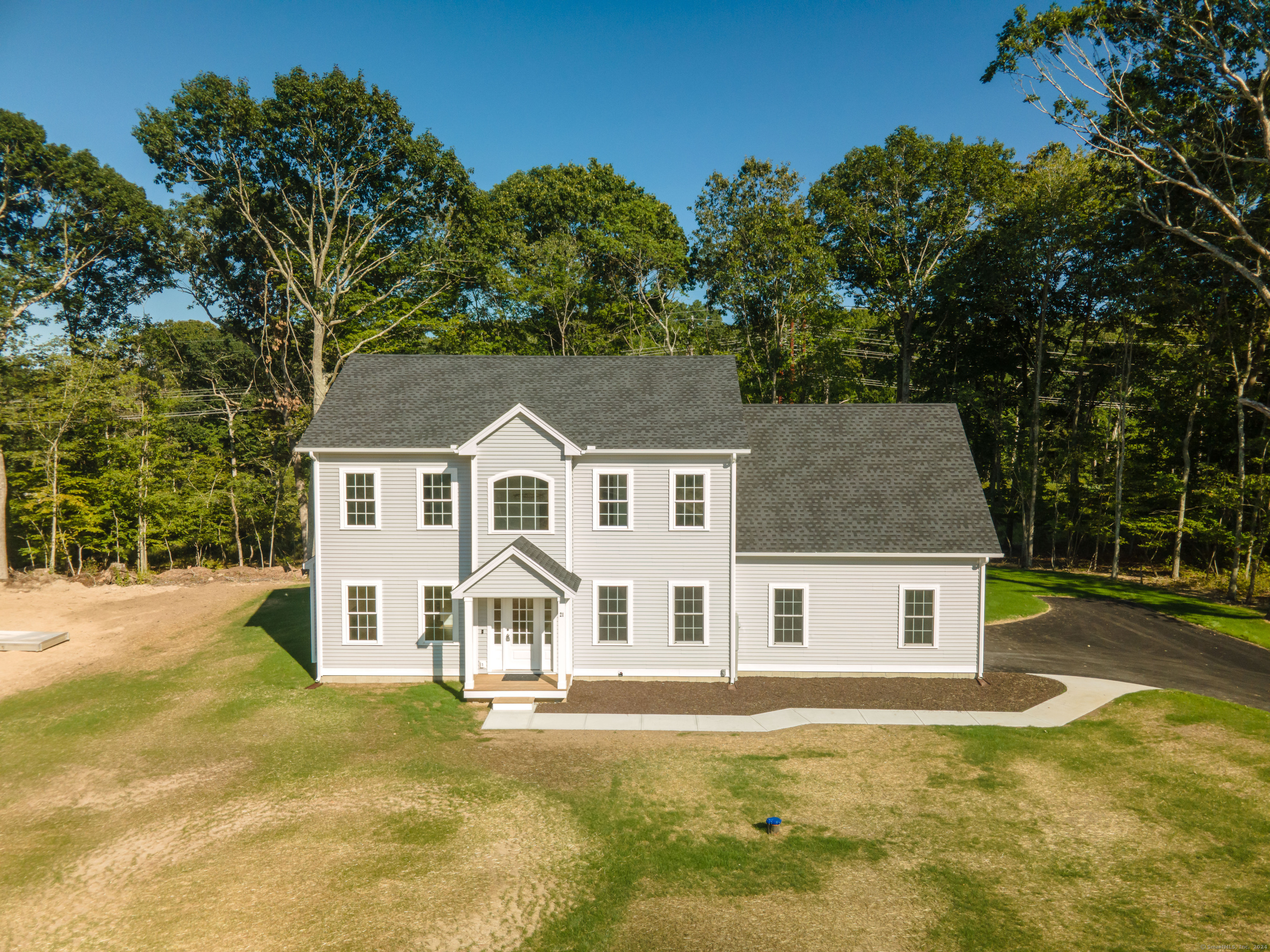 21 Marty's Way Gales Ferry, CT 06335 - Photo 1 of 1 a front view of a house with a yard