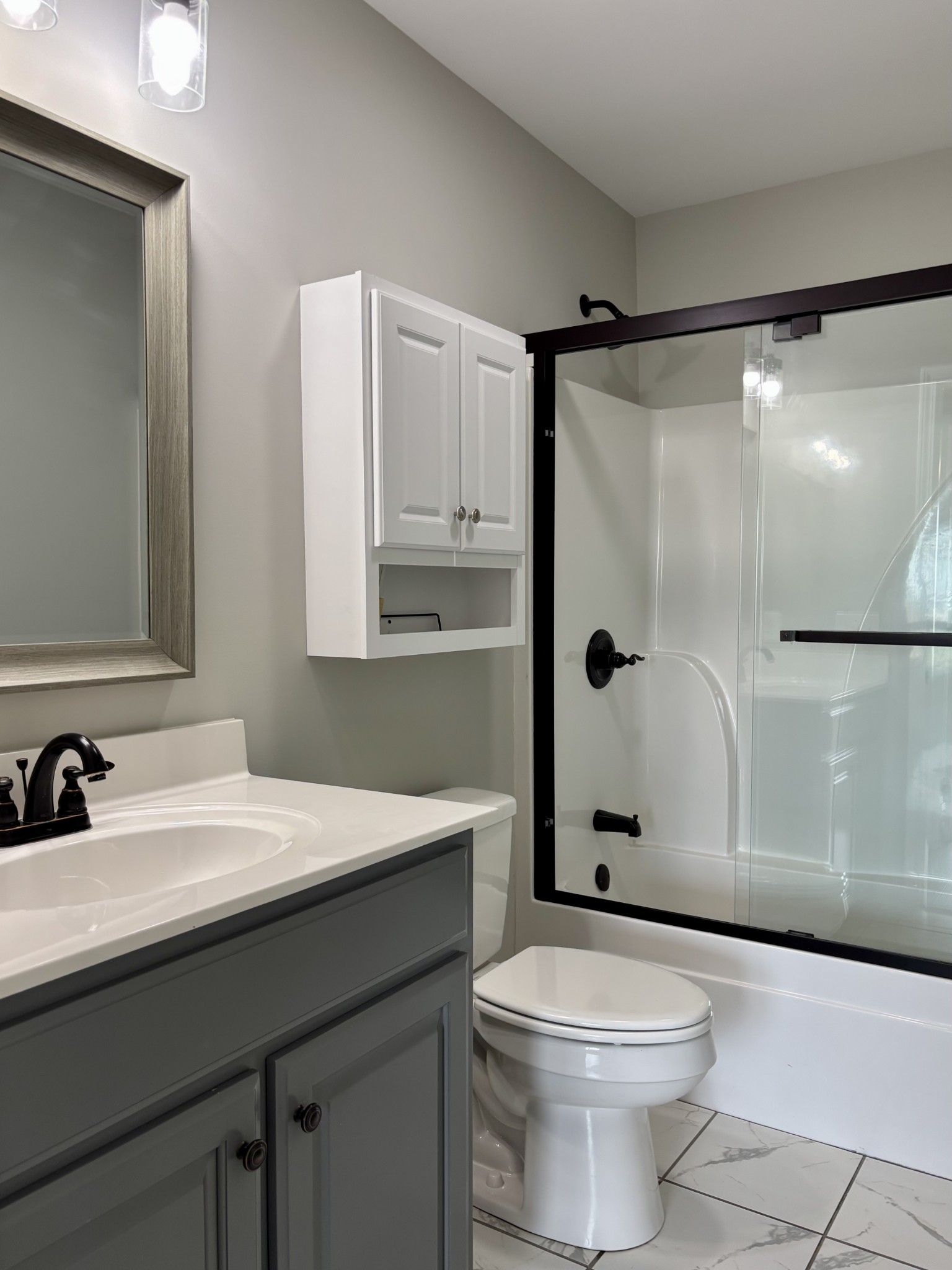 51 Regency Place Manchester, TN 37355 - Photo 18 of 27 a bathroom with a sink a toilet and shower