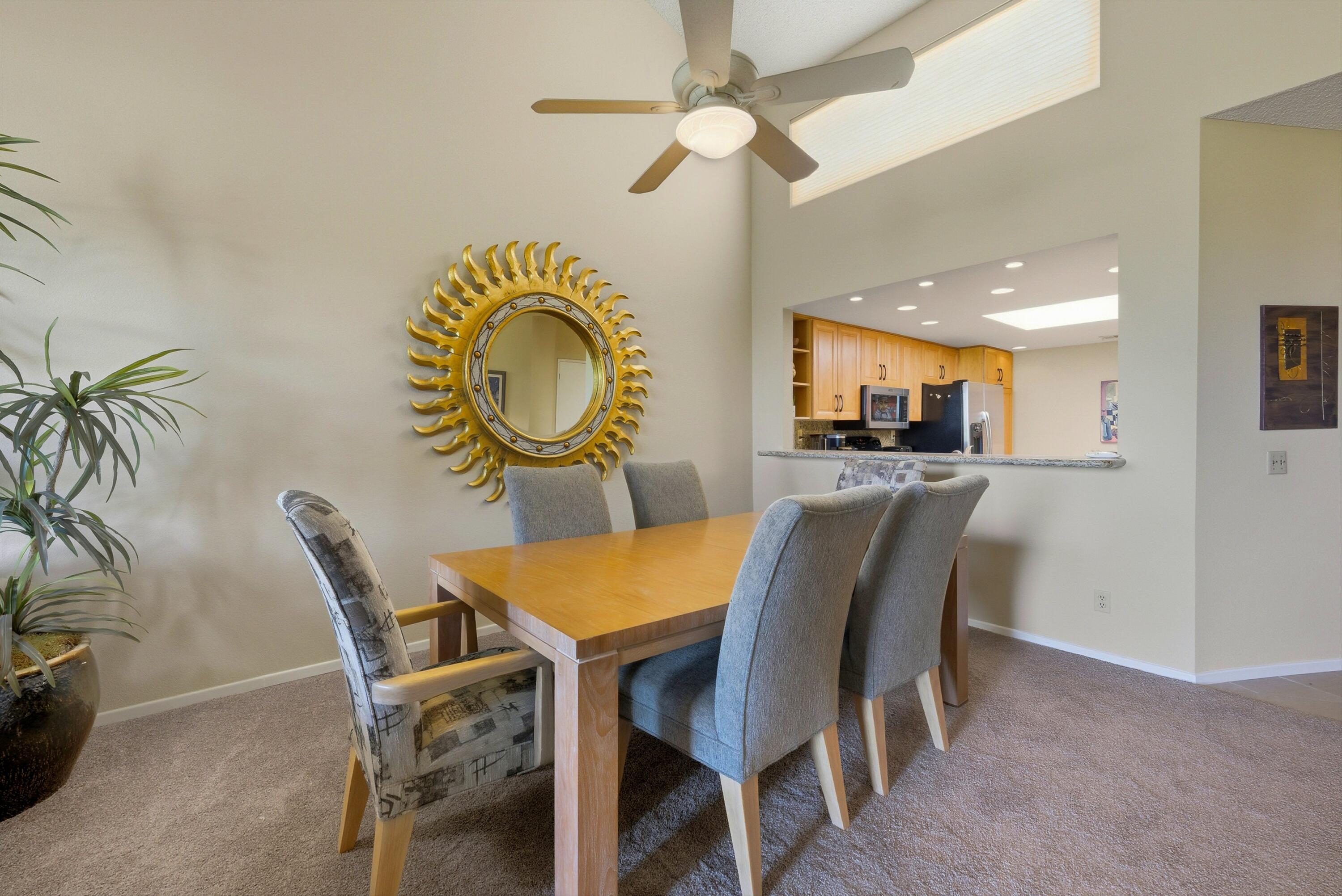 54860 Inverness Way La Quinta, CA 92253 - Photo 19 of 26 a dining room with furniture and window