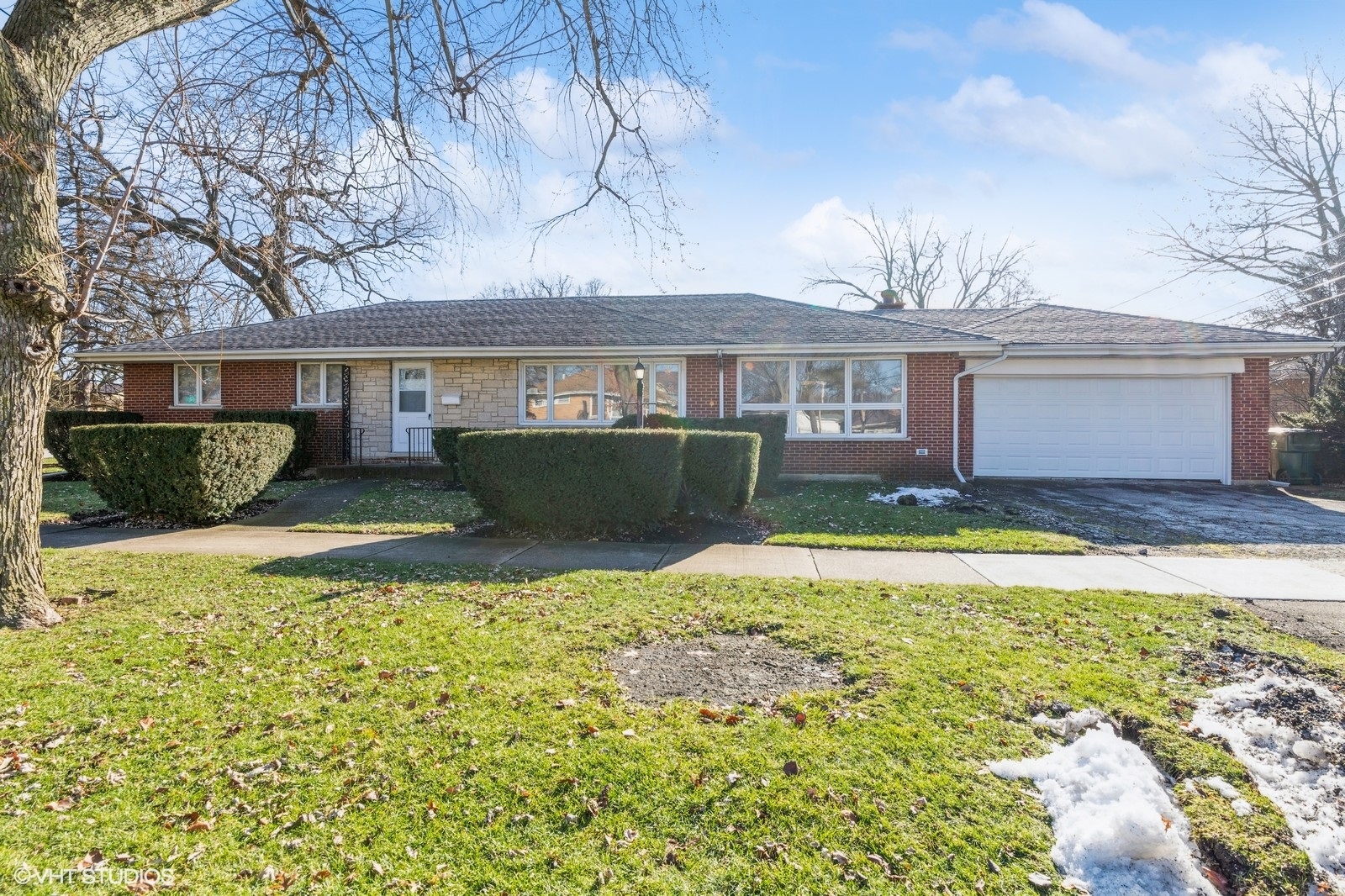 546 North Dee Road Park Ridge, IL 60068 - Photo 1 of 18 a front view of a house with a yard and potted plants
