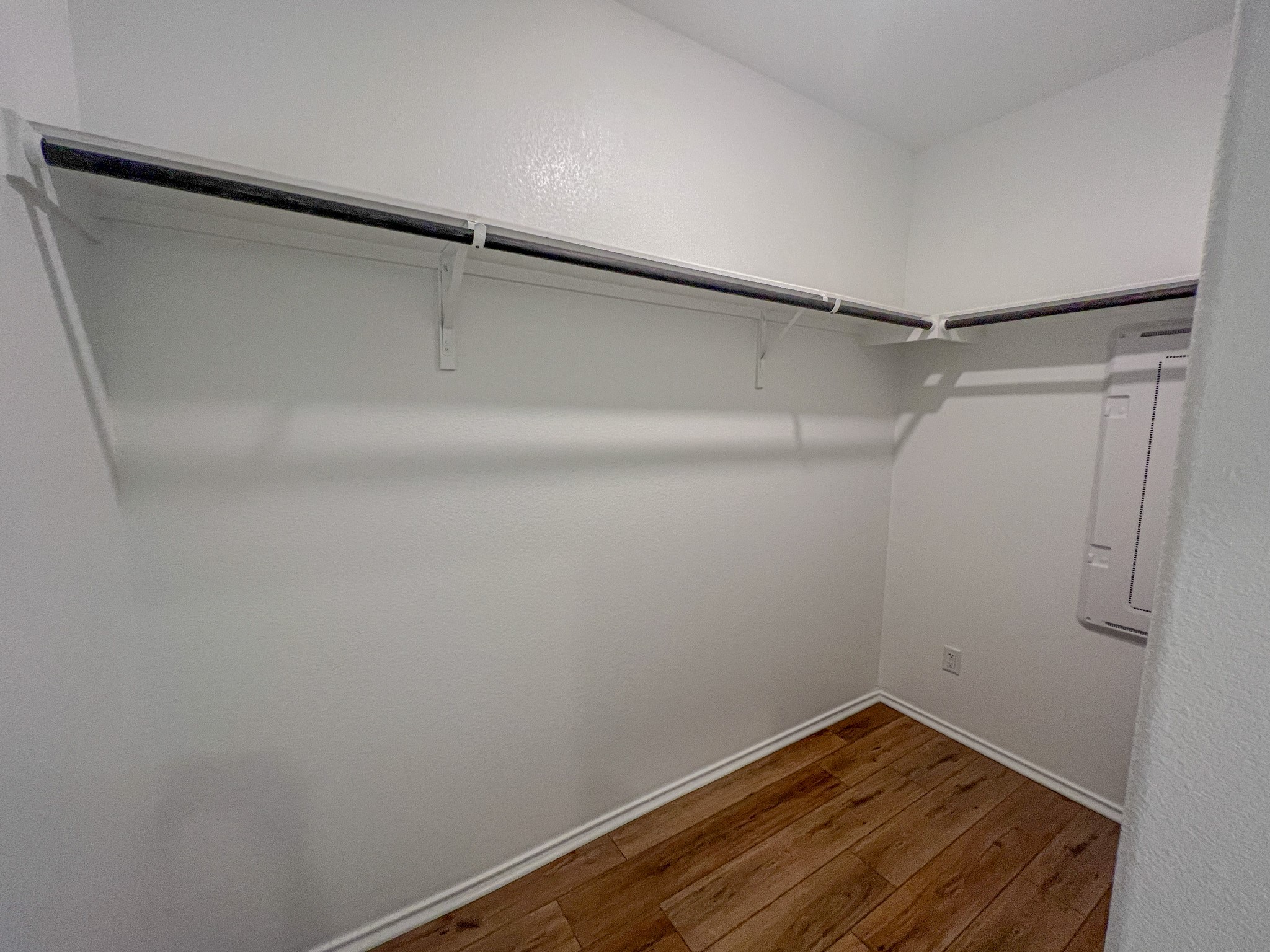438 Perfect World Loop Jarrell, TX 76537 - Photo 13 of 35 a view of a room with wooden floor