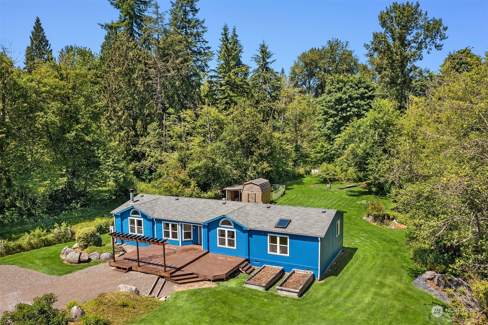 28932 Northeast Big Rock Road Duvall, WA 98019 - Photo 1 of 27 an aerial view of a house with swimming pool garden and patio