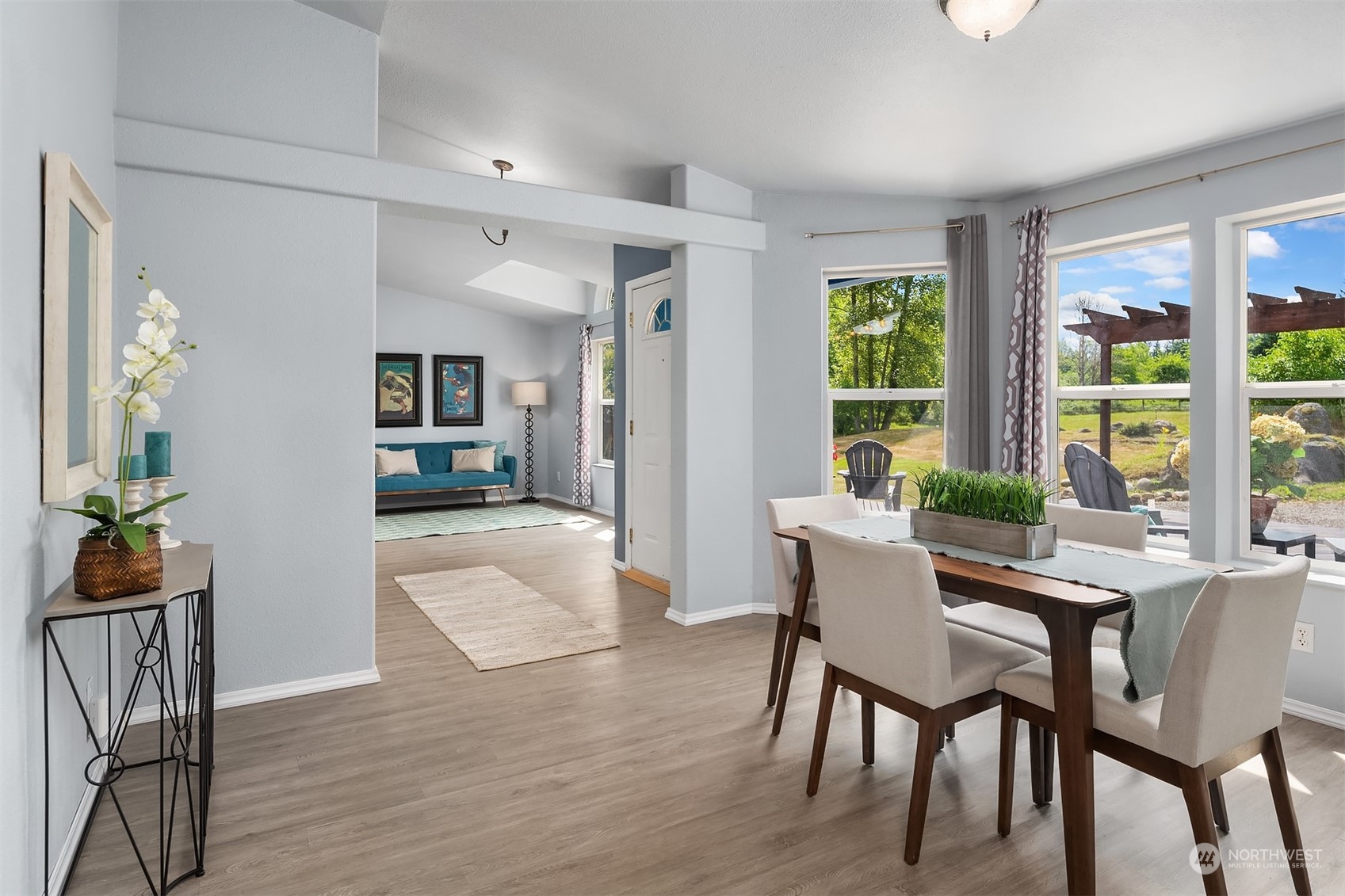 28932 Northeast Big Rock Road Duvall, WA 98019 - Photo 12 of 27 a view of a dining room with furniture window and wooden floor