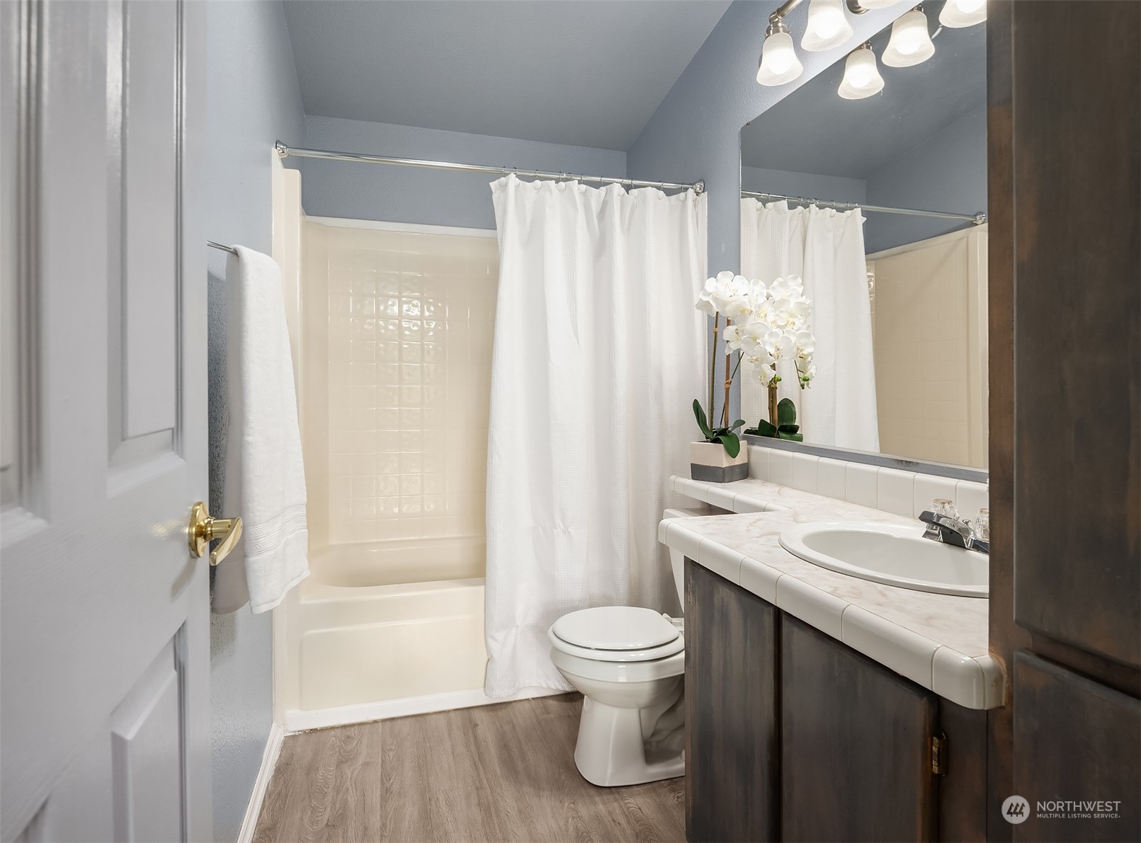 28932 Northeast Big Rock Road Duvall, WA 98019 - Photo 19 of 27 a bathroom with a sink a toilet and shower