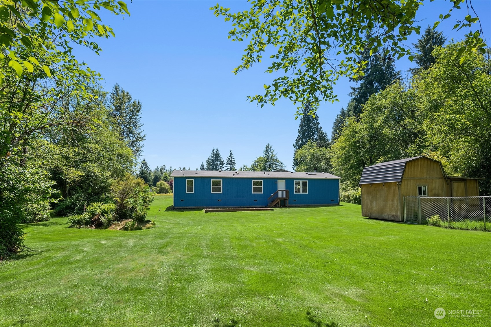 28932 Northeast Big Rock Road Duvall, WA 98019 - Photo 22 of 27 a view of a house with a yard