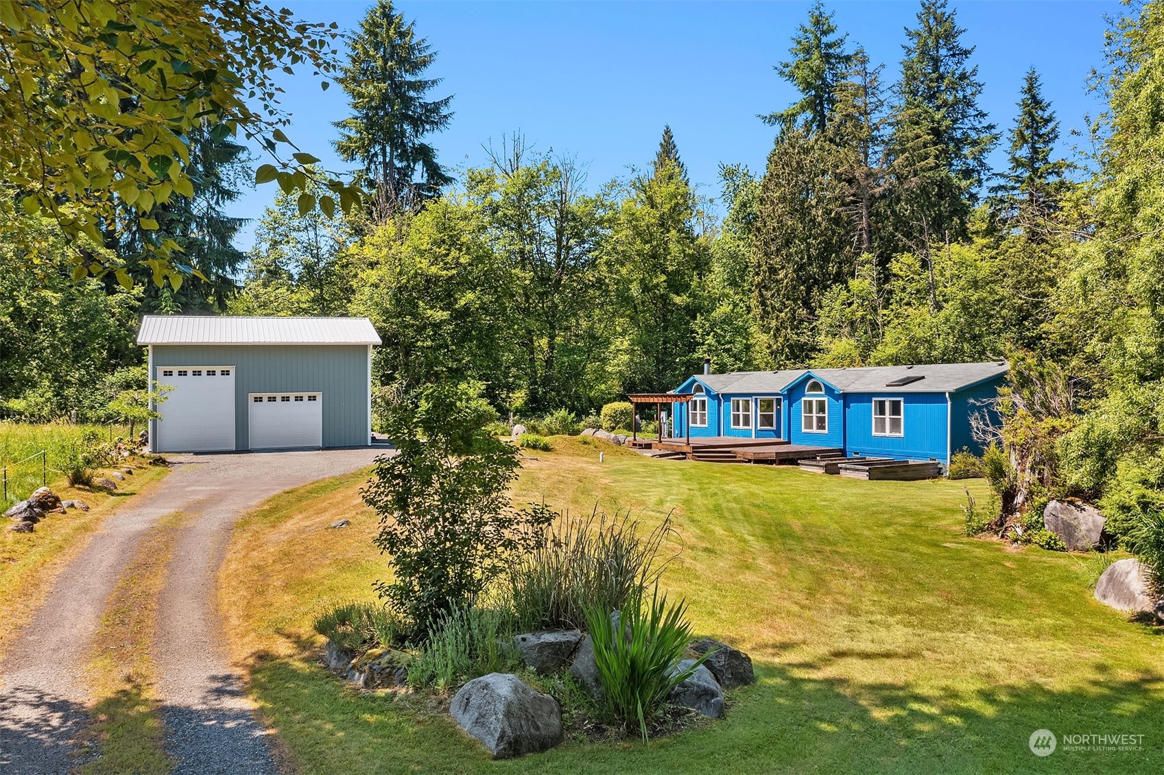 28932 Northeast Big Rock Road Duvall, WA 98019 - Photo 26 of 27 a front view of a house with a yard