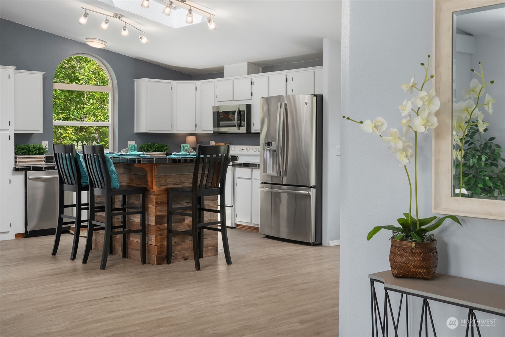 28932 Northeast Big Rock Road Duvall, WA 98019 - Photo 7 of 27 a view of a dining room with furniture window and wooden floor