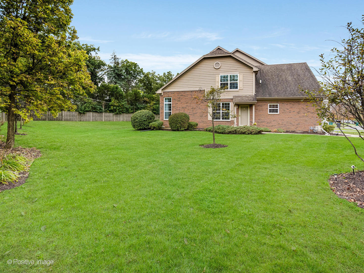 10 Carrington Circle Burr Ridge, IL 60527 - Photo 3 of 10 a view of a house with a big yard potted plants and large tree