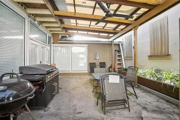 a view of a yard with a tree