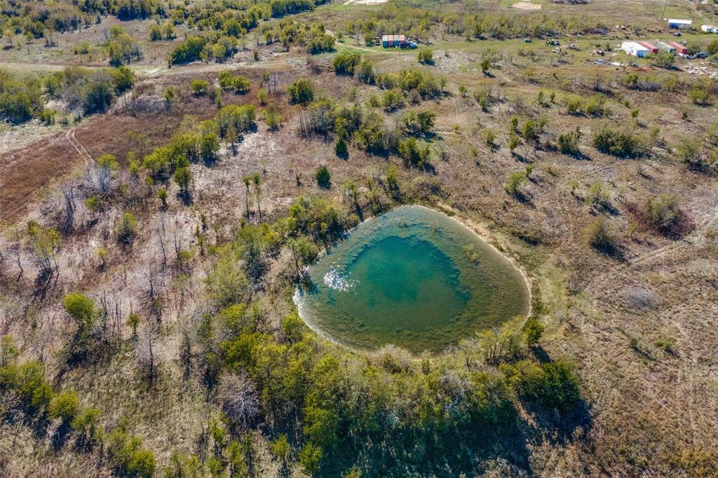 an aerial view of residential house with outdoor space