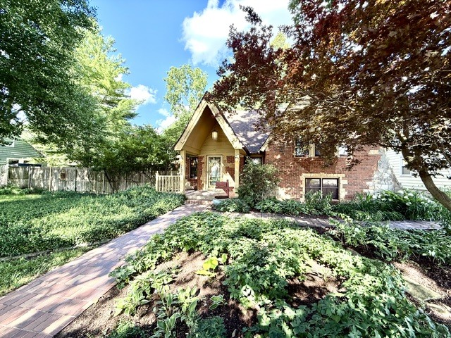 720 South New Street Champaign, IL 61820 - Photo 69 of 73 a front view of a house with a yard