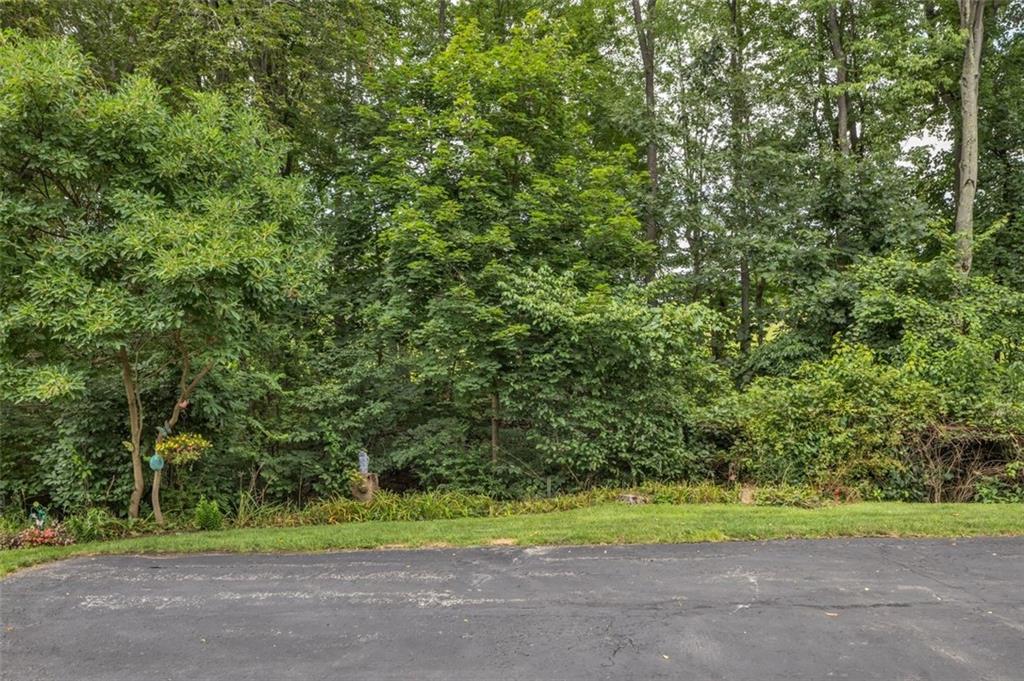 21 Unity Square Greensburg, PA 15601 - Photo 19 of 27 Enjoy the peaceful wooded view from the 3 season room