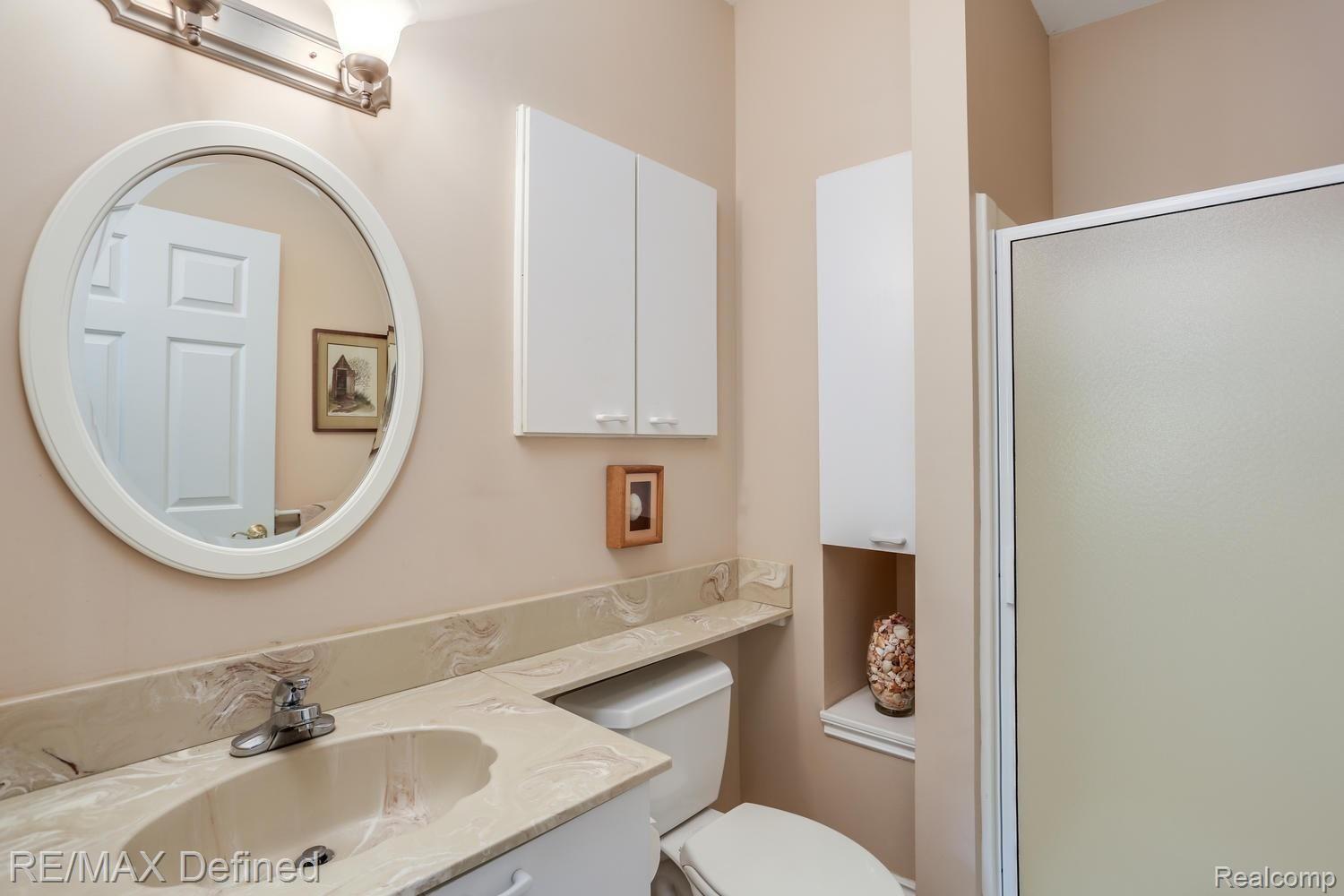 4205 Sheldon Road Rochester, MI 48306 - Photo 22 of 50 Solid surface counters in the full bathroom on the entry level.