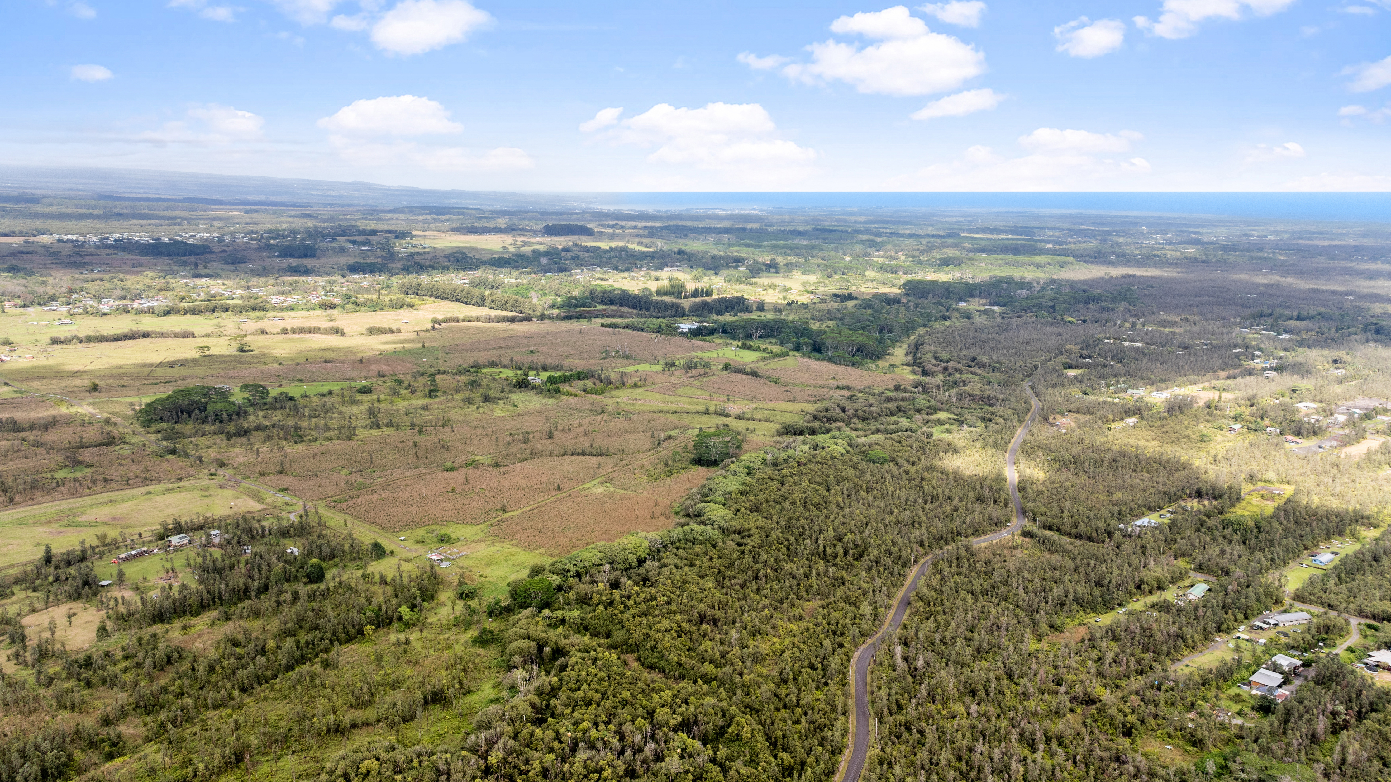 18-3780 Lot 112-b Pszyk Rd Mountain View Mountain View, HI 96771 - Photo 23 of 28 a view of an ocean and beach