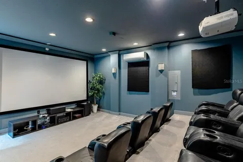 a room with furniture and a flat screen tv