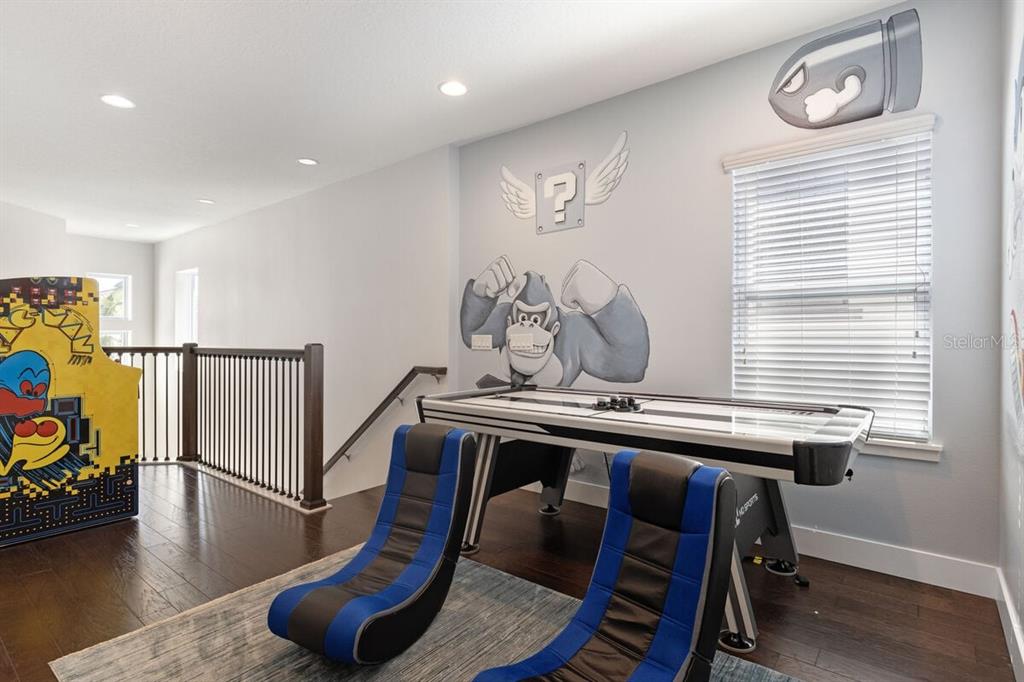 1036 Castle Pines Court Reunion, FL 34747 - Photo 13 of 50 a view of a room with gym equipment