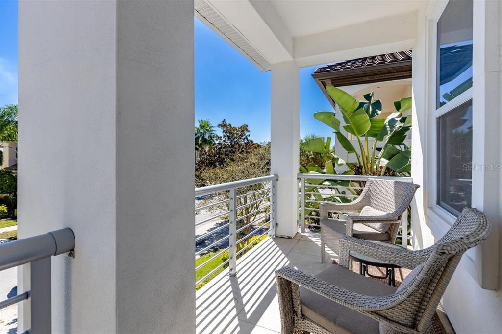 1036 Castle Pines Court Reunion, FL 34747 - Photo 18 of 50 a view of a dining room with furniture window and outside view