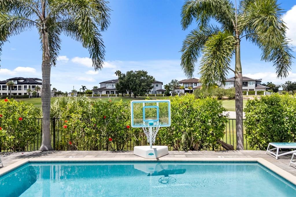 1036 Castle Pines Court Reunion, FL 34747 - Photo 33 of 50 a view of a yard with a patio