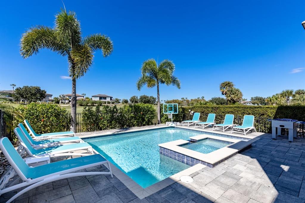 1036 Castle Pines Court Reunion, FL 34747 - Photo 35 of 50 a view of a chairs and table in patio