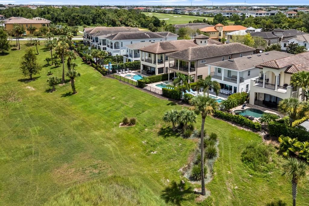 1036 Castle Pines Court Reunion, FL 34747 - Photo 50 of 50 a view of a town with mountains in the background