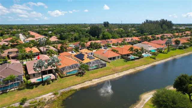 an aerial view of a house with a garden