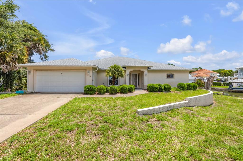 192 Azalea Road Edgewater, FL 32141 - Photo 54 of 94 a view of house with outdoor space and porch