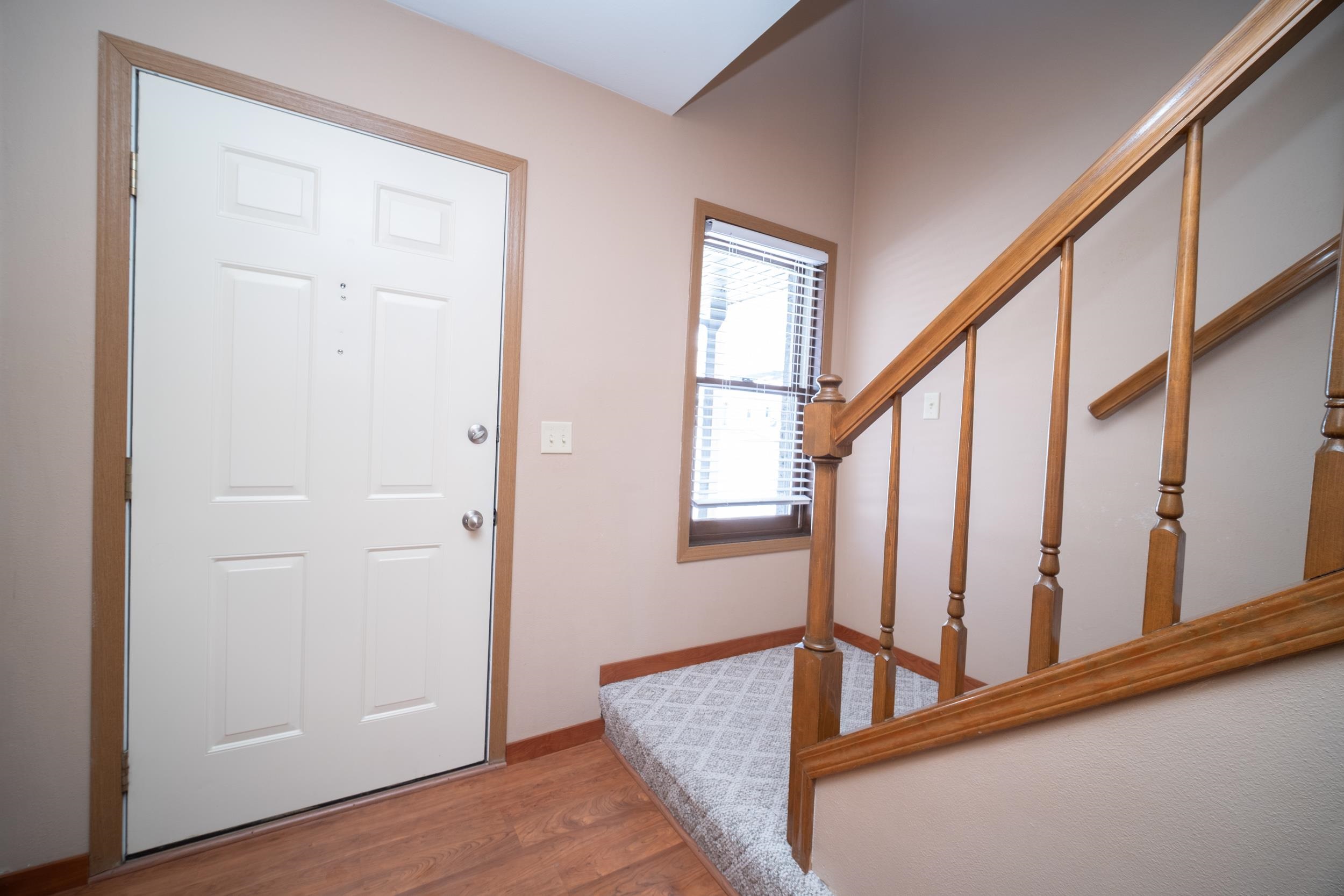 1845 Bright View Drive Loves Park, IL 61111 - Photo 4 of 20 a view of staircase with wooden floor and stairs