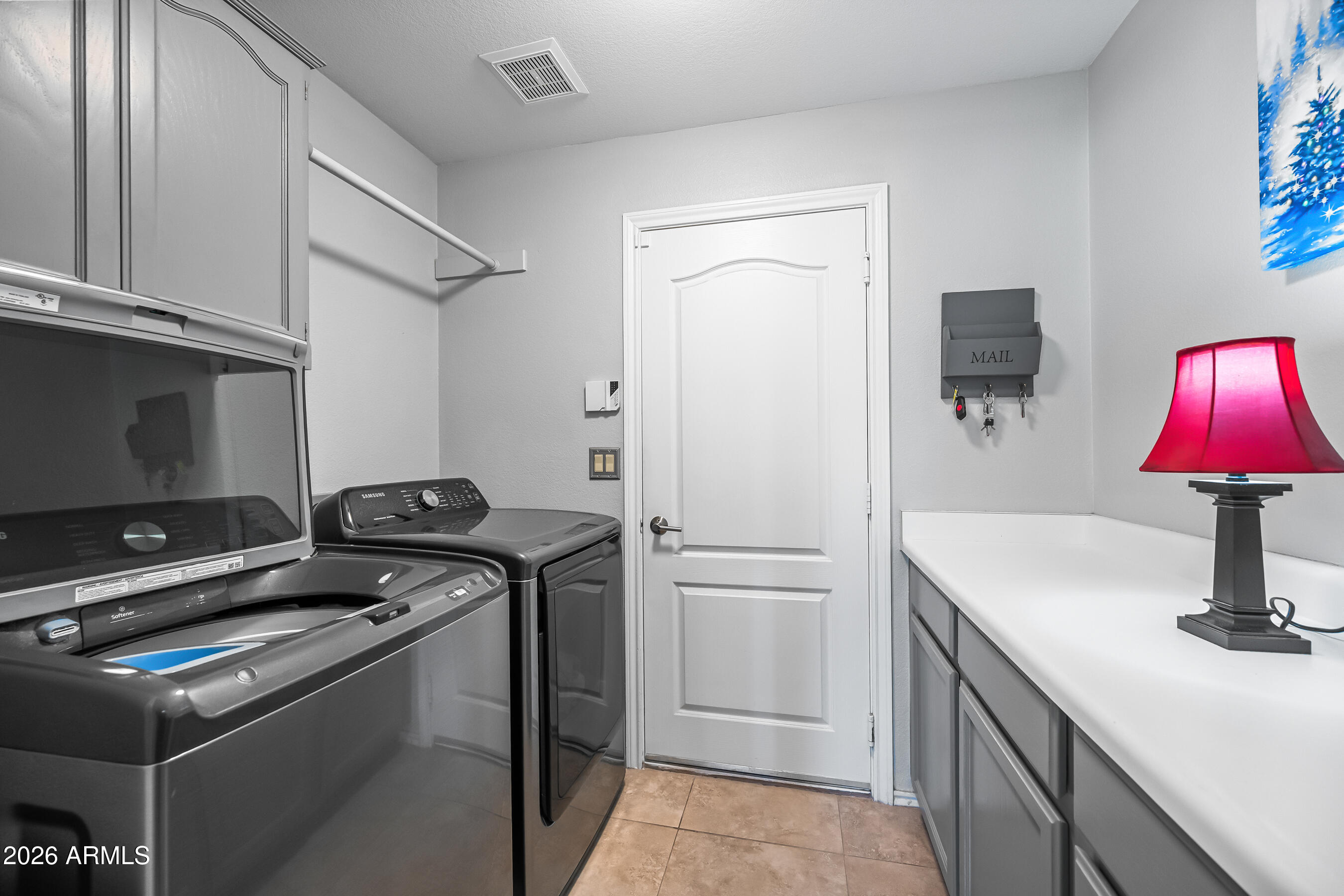 16006 South 13th Place Phoenix, AZ 85048 - Photo 26 of 63 laundry on first floor with garage entry
