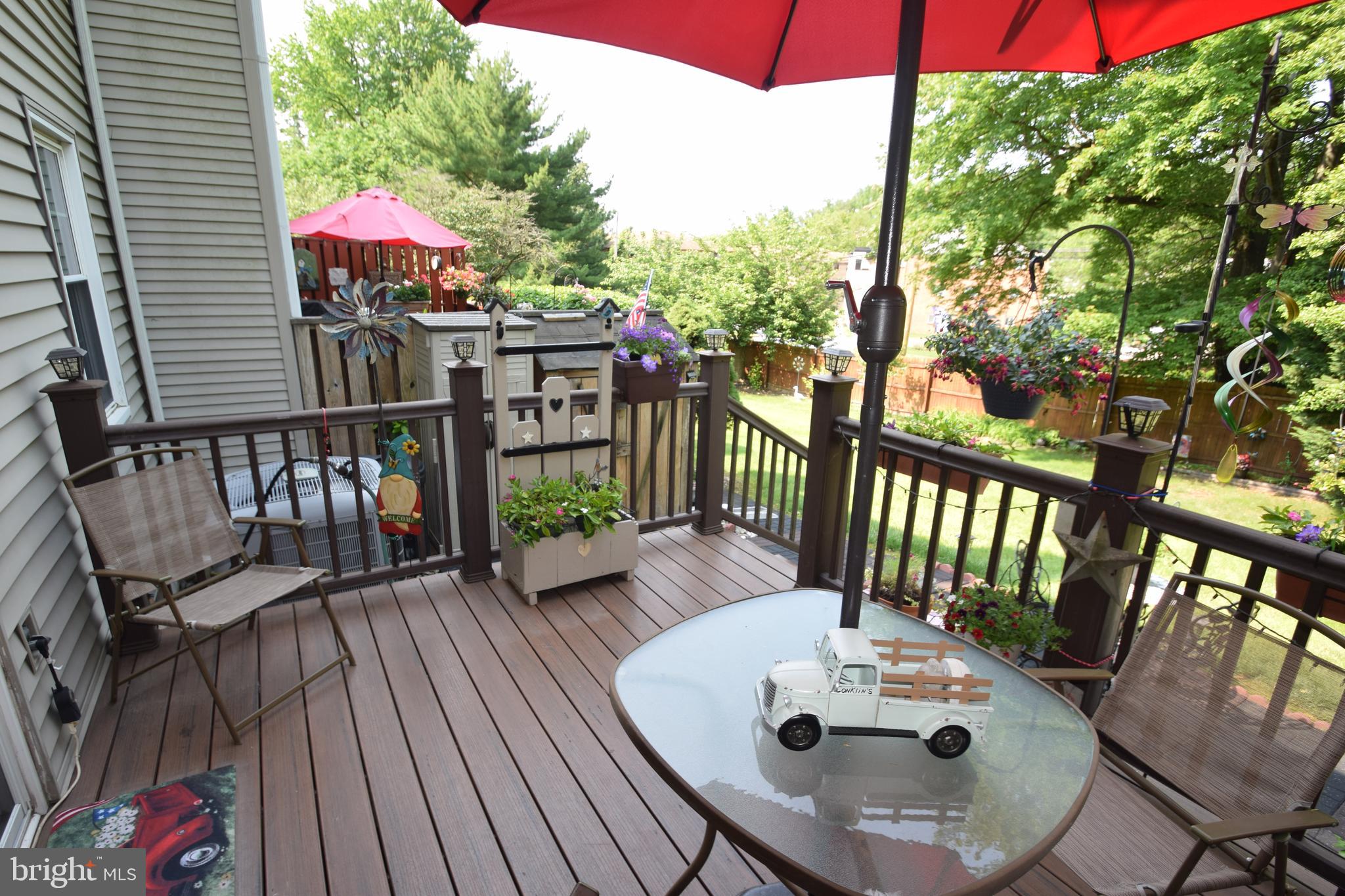 129 Woodhill Road Wilmington, DE 19809 - Photo 19 of 25 a view of a patio with wooden floor