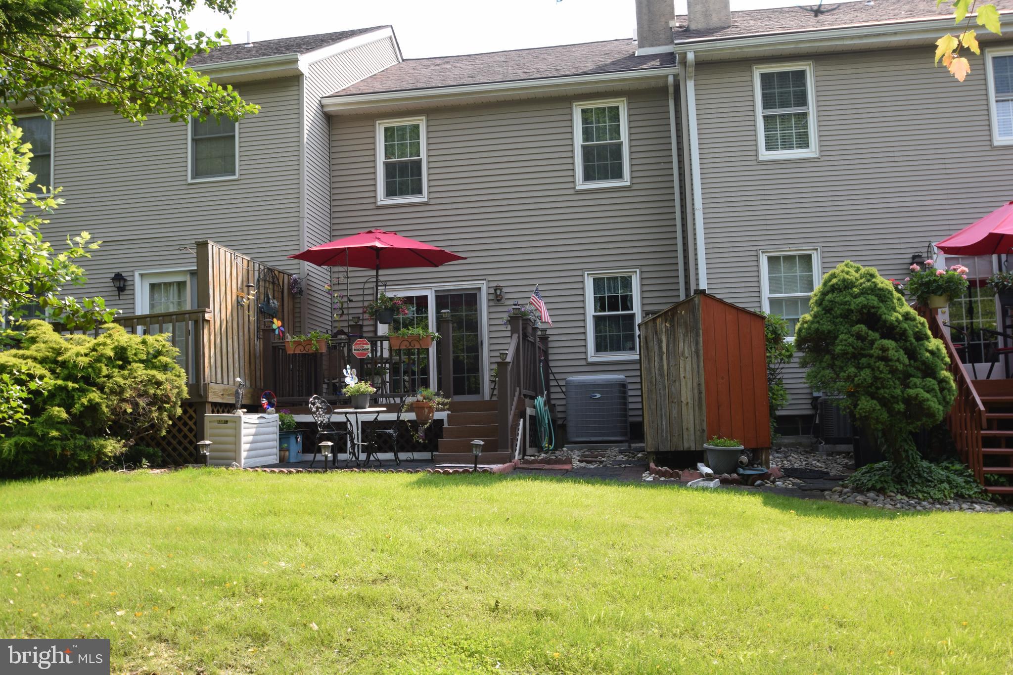 129 Woodhill Road Wilmington, DE 19809 - Photo 21 of 25 a view of a house with backyard porch and sitting area