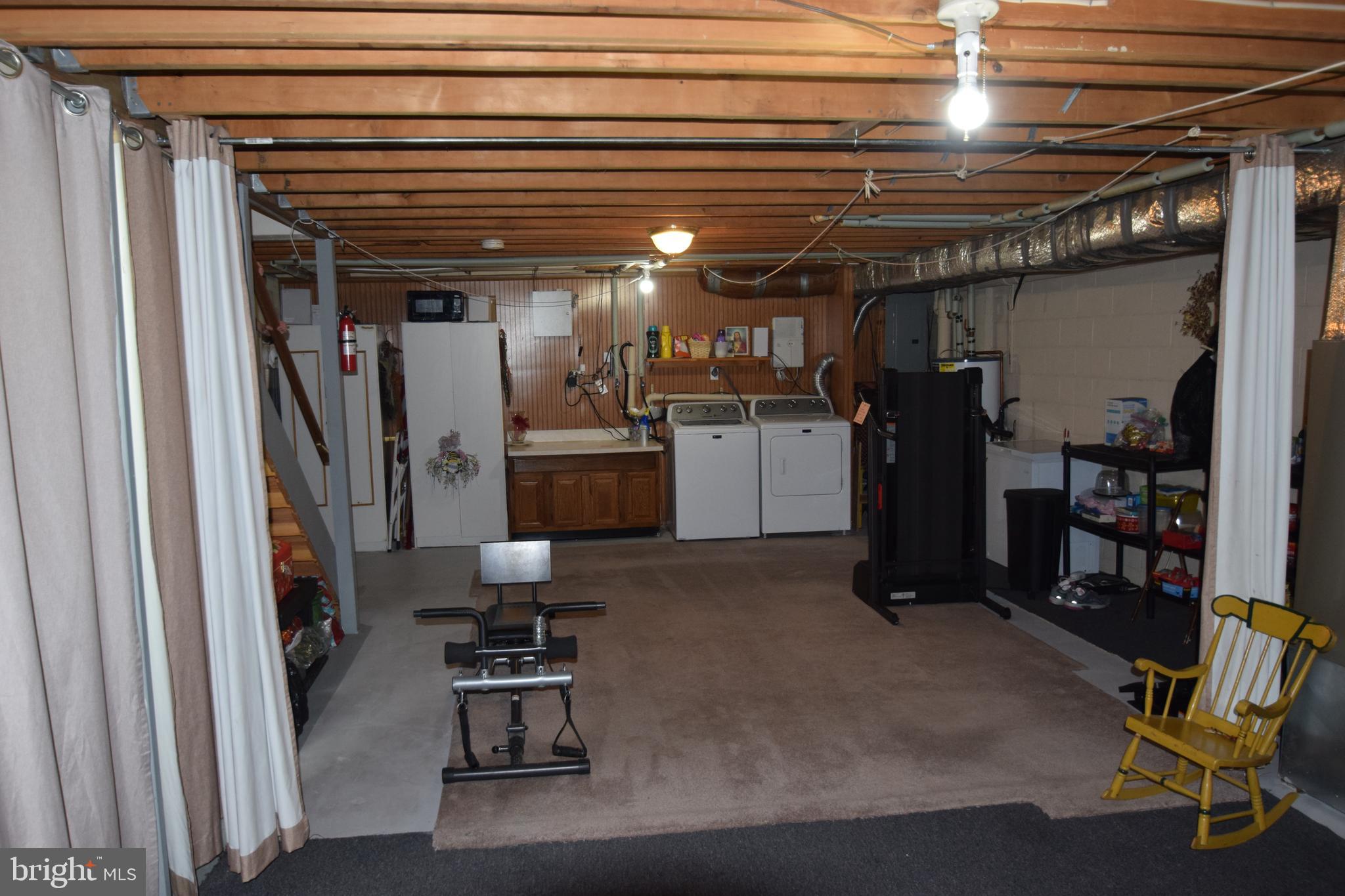 129 Woodhill Road Wilmington, DE 19809 - Photo 24 of 25 a view of a room with gym equipment