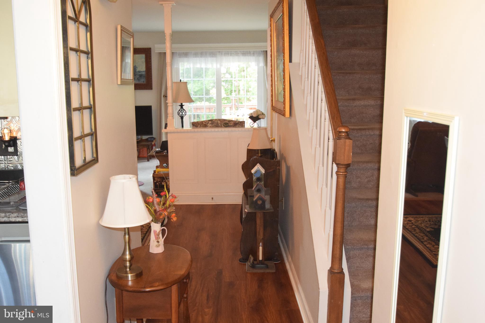 129 Woodhill Road Wilmington, DE 19809 - Photo 3 of 25 a view of living room with furniture and wooden floor