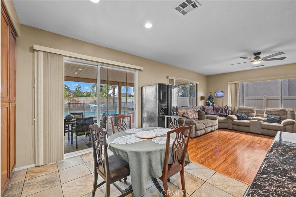 150 Saddleback Way Perris, CA 92570 - Photo 16 of 46 a view of a dining room with furniture