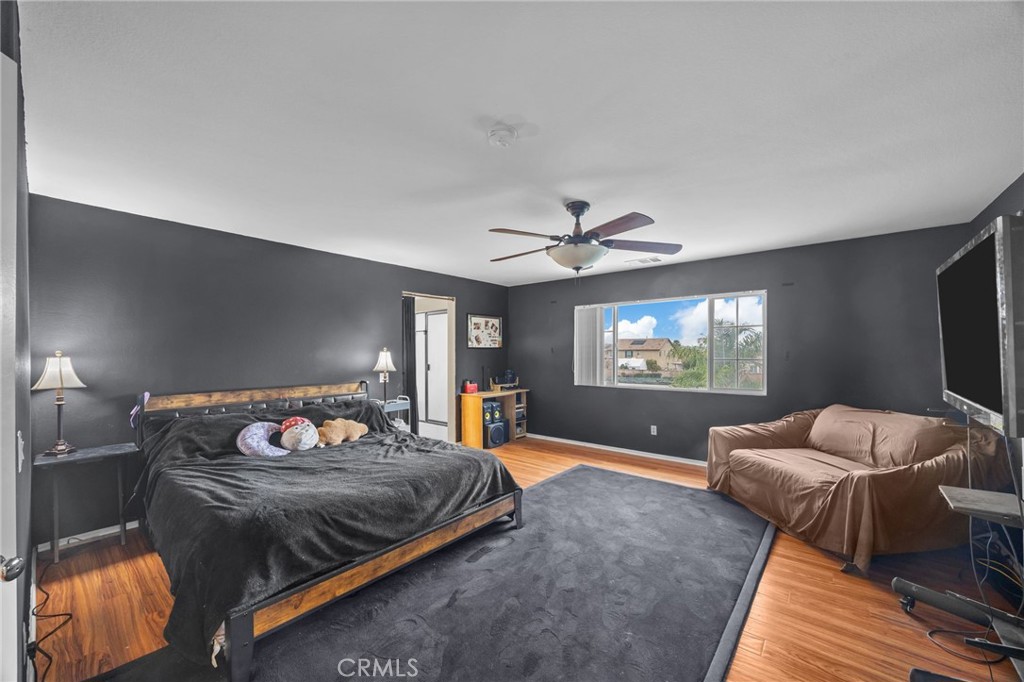 150 Saddleback Way Perris, CA 92570 - Photo 26 of 46 a bedroom with furniture and a flat screen tv