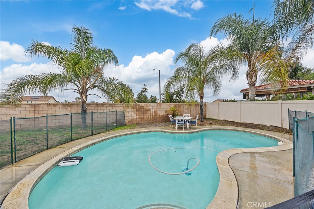 150 Saddleback Way Perris, CA 92570 - Photo 35 of 46 swimming pool view with a garden space