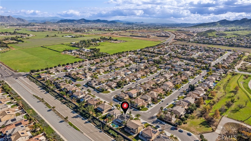 150 Saddleback Way Perris, CA 92570 - Photo 45 of 46 an aerial view of residential houses with outdoor space