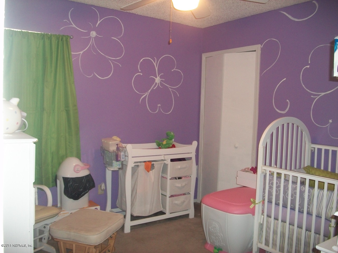 869 Jackson Road Jacksonville, FL 32225 - Photo 7 of 10 a bathroom with a sink toilet and shower