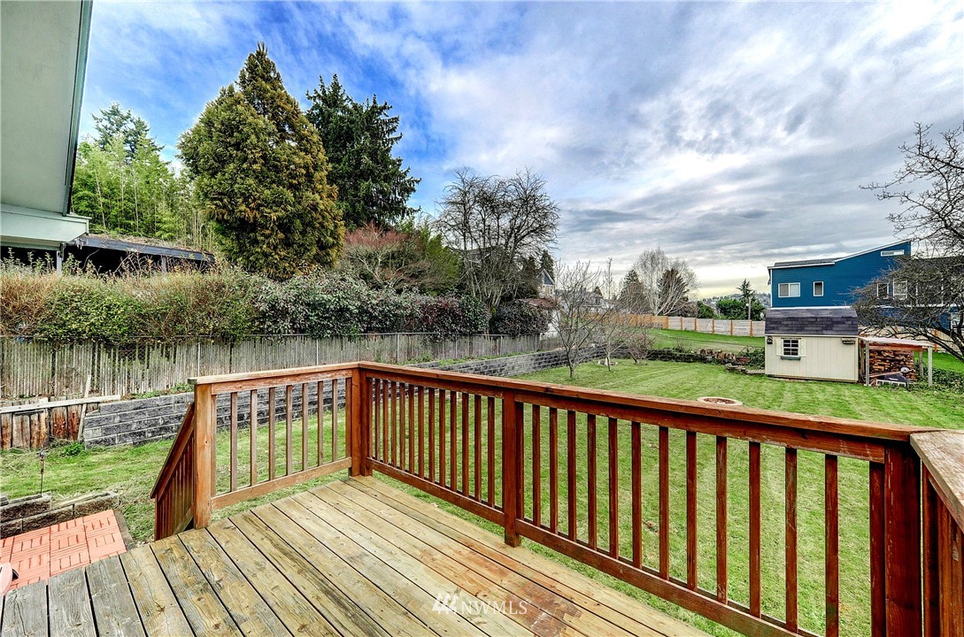 366 Earlington Avenue Southwest Renton, WA 98057 - Photo 28 of 33 a view of balcony with wooden floor and lake view
