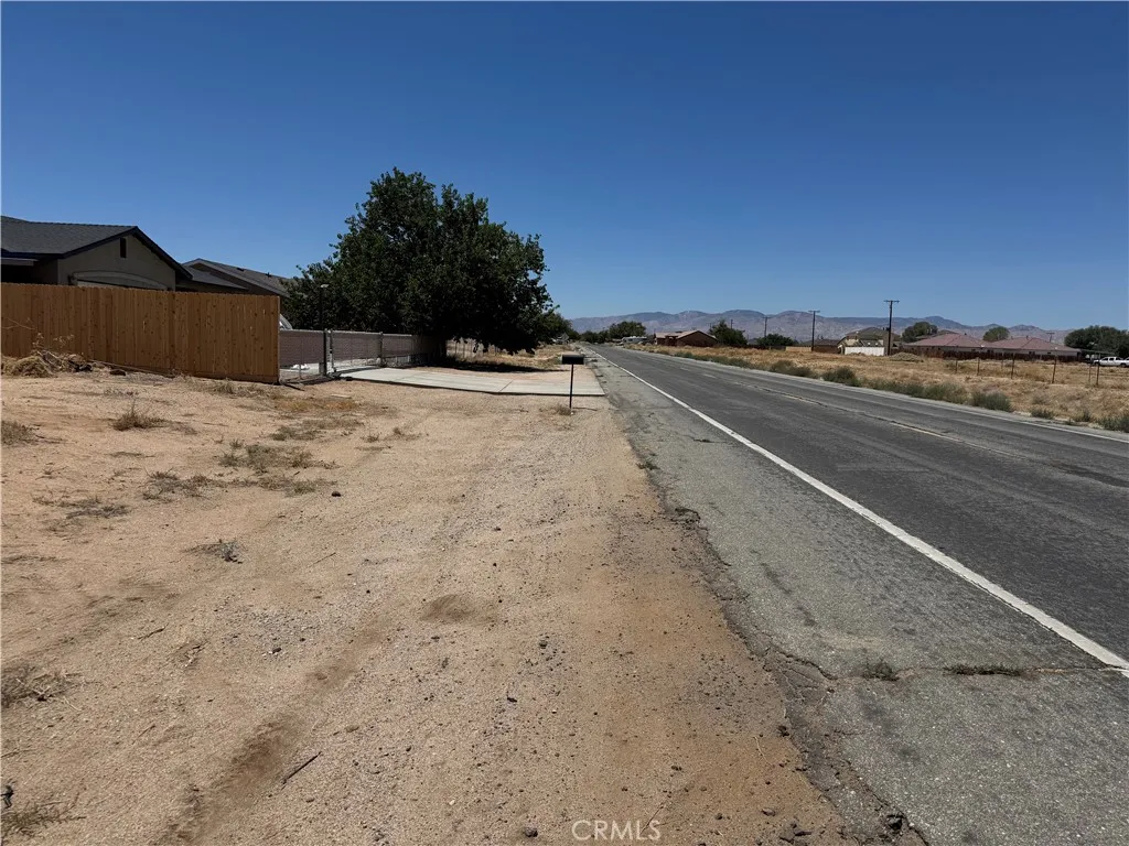 0 S Loop Riverside, CA 92505 - Photo 4 of 7 a view of a dry yard with a house