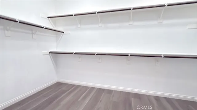 a view of an empty walk in closet