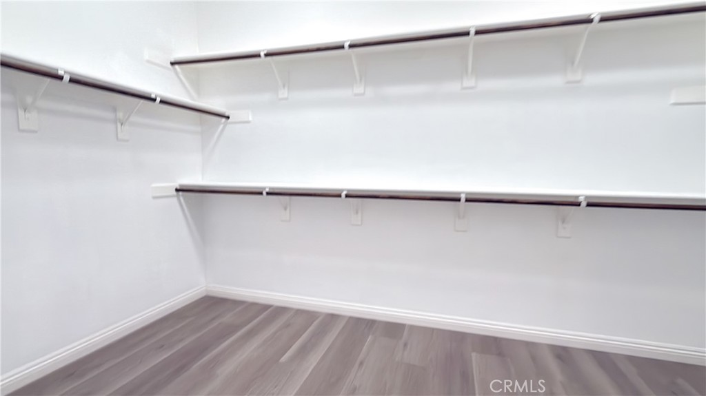 7833 Wild Rye Street Chino, CA 91708 - Photo 20 of 44 a view of a room with shelf on the wall