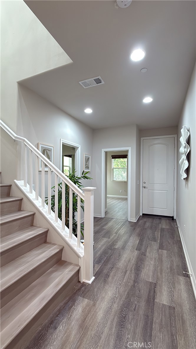 7833 Wild Rye Street Chino, CA 91708 - Photo 36 of 44 a view of entryway with wooden floor