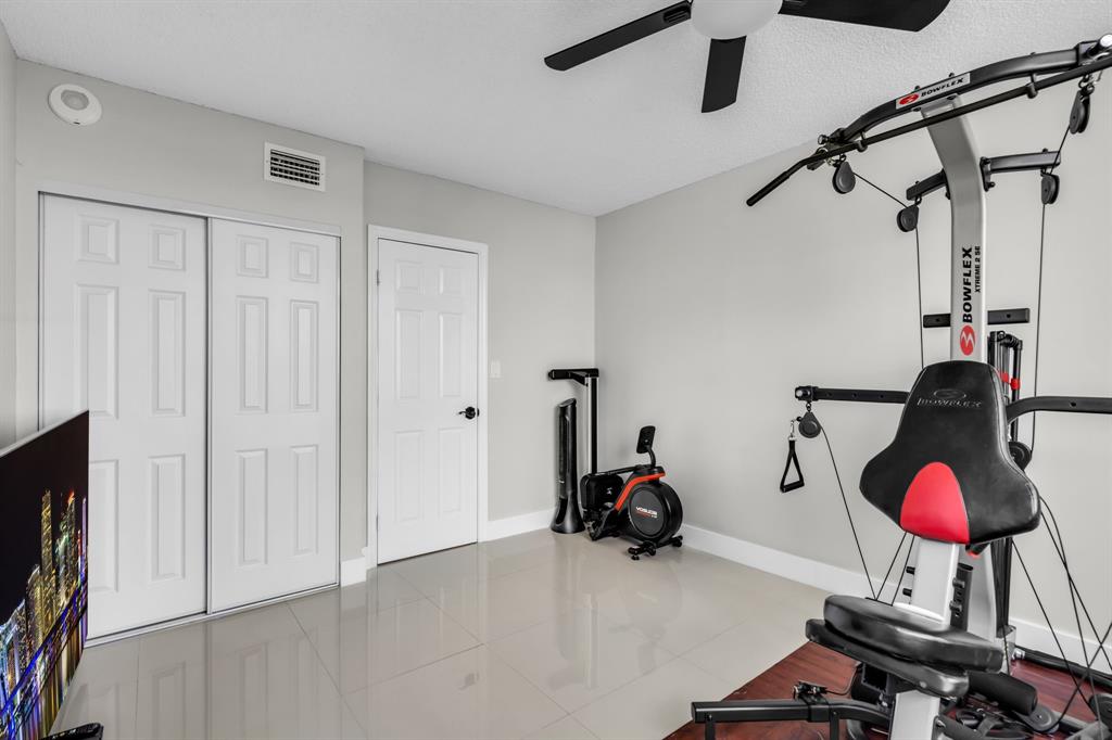 4200 Hillcrest Drive, Unit 711 Hollywood, FL 33021 - Photo 11 of 37 a view of a room with gym equipment