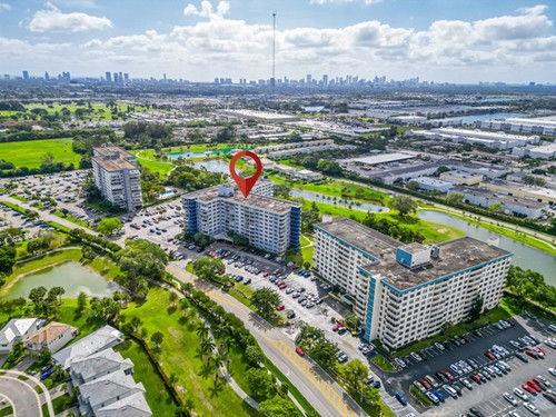 4200 Hillcrest Drive, Unit 711 Hollywood, FL 33021 - Photo 29 of 37 a view of a balcony with wooden floor