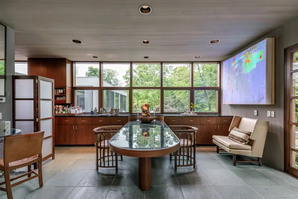 a living room with furniture and a window