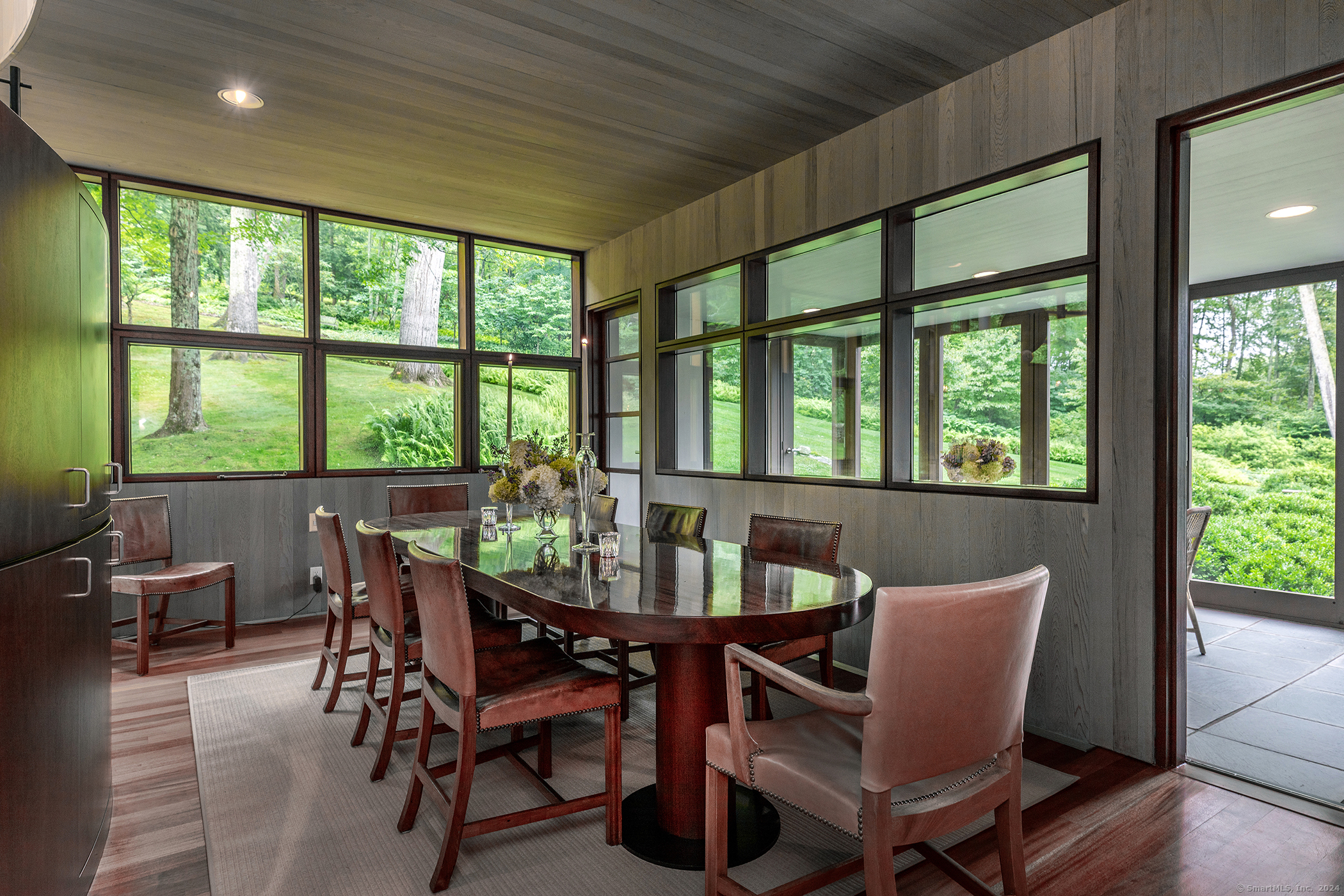 23 Mauwee Brook Road Kent, CT 06757 - Photo 20 of 40 a view of a dining room with furniture window and outside view